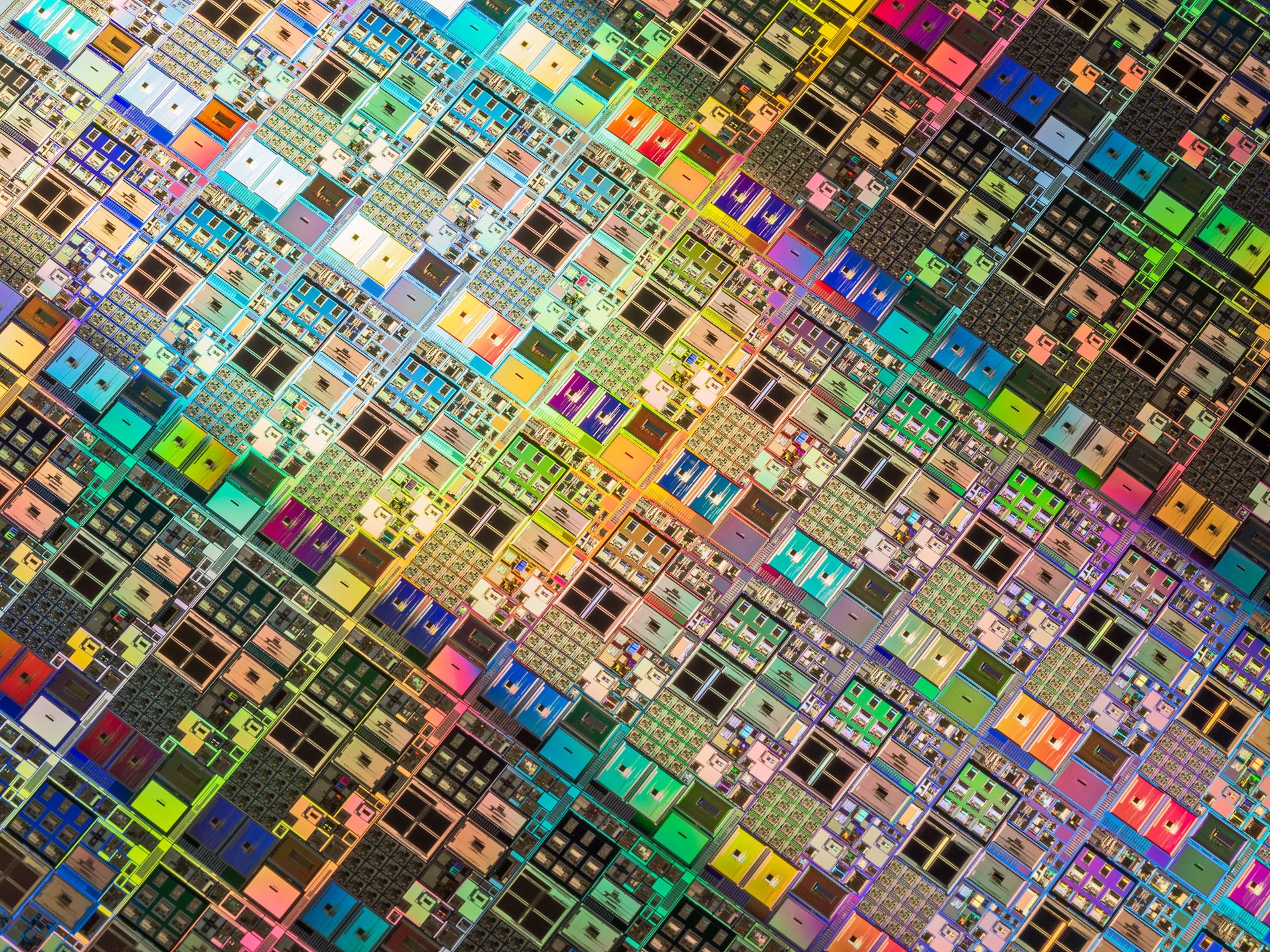 1141250737-Intricacy of Silicon Computer Wafer Colorful Details.