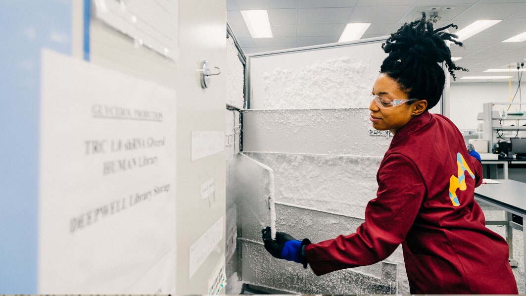 Employee pulling bacterial stocks to fill customer orders in St. Louis, USA (Spruce facility)