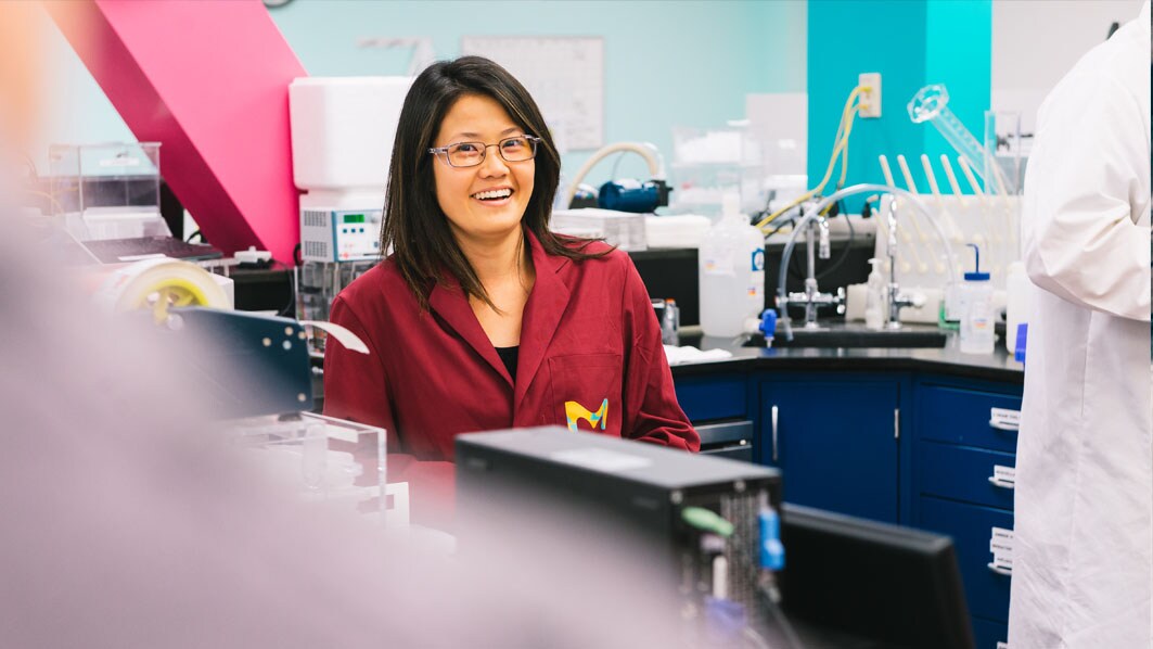 Employee working in the quality control Lab in St. Louis, USA (Dekalb facility)