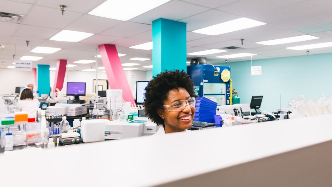 Employee working in the quality control lab in St. Louis, USA (Dekalb facility)