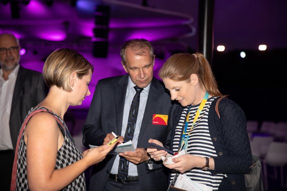 The orga team comparing notes