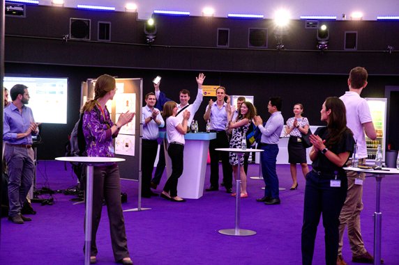 Poster session at the back of the auditorium