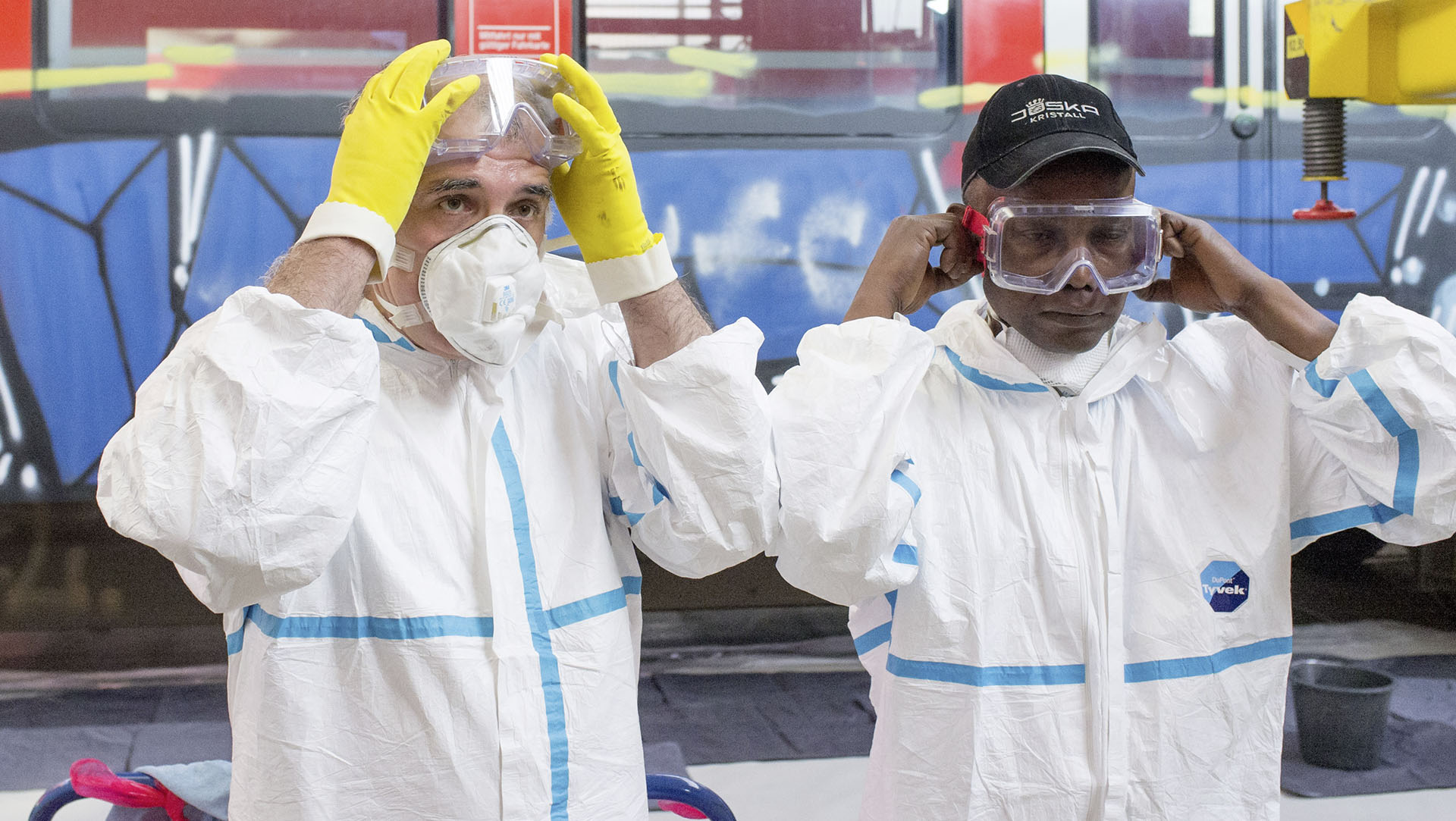 It takes railcar cleaners Kwasi Ofosu and Kaya Gaffar an entire day to clean one railcar of an urban train.