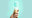    A hand holding an ice cream cone filled with a lightbulb