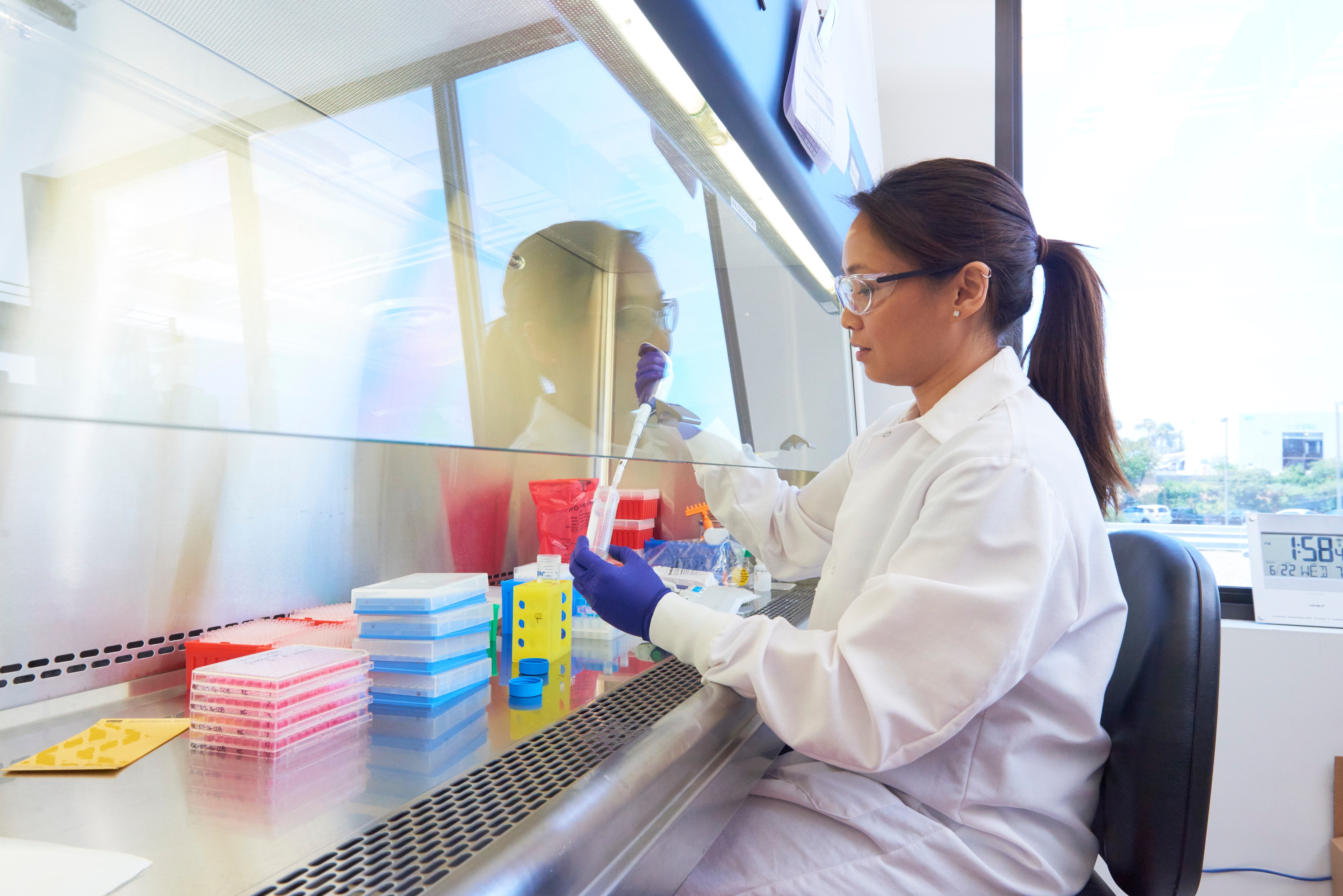 Kathrina Cunanan, quality control analyst at Tocagen conducting assays